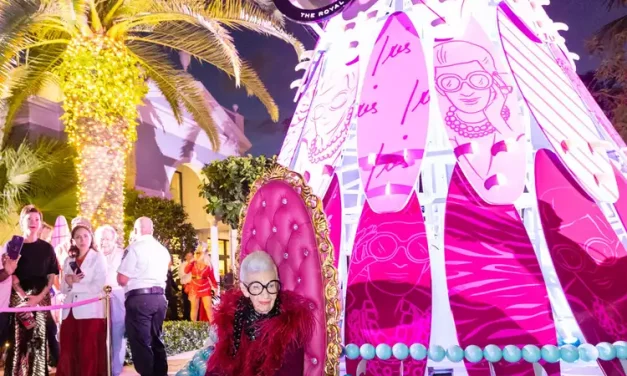 101-Year-Old Fashion Legend Iris Apfel Lights Up a Giant Holiday Tree That Wears Her Iconic Glasses